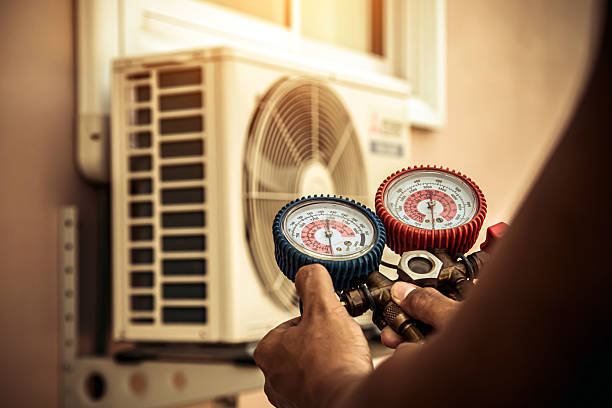 Professional Heat Pump Repair technician working in Halethorpe, MD